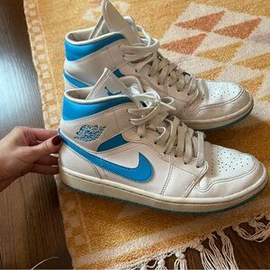 White and blue 1 mid Jordan’s